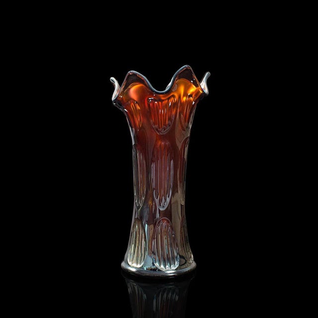 This is a small vintage decorative vase. An English, carnival glass flower vase, dating to the mid 20th century, circa...