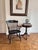 This vintage Windsor-style captain’s chair was designed for formal university settings and often given to alumni as a...