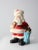 This is a 1973 Ann's Original Figurines' Santa coin bank. The large Christmas statuary features Santa carrying a bell with...