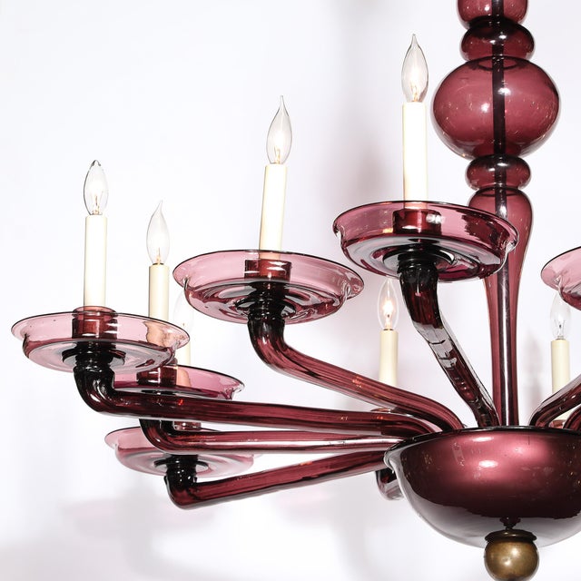 This Modernist Murano glass chandelier, crafted in Italy in the 20th century, embodies the timeless elegance and artisanal...
