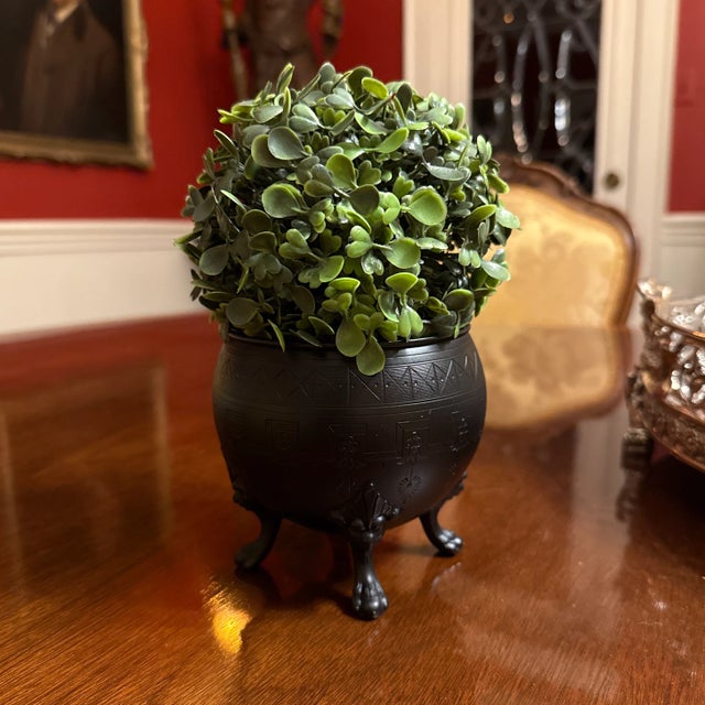 Handsome Victorian Black Metal Bowl in the Regency taste on 4 lions paw feet with lions heads above, nice incised...