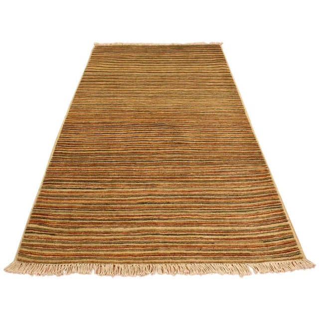 With strict standards of craftsmanship and quality of materials used this modern inspired hand knotted Gabbeh rug is a...