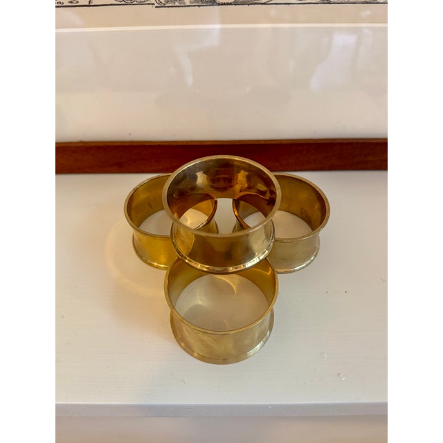 Set of four vintage brass napkin rings, never used. Excellent condition.