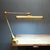 ABOUT An original fully adjustable Art Deco floating arm articulating desk lamp. Large clamp secures to any table....