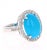 Beautiful Turquoise Diamond Cabochon Cocktail Ring! The Oval Cut Cabochon Turquoise is 4.79 Carats and has a halo of 32...
