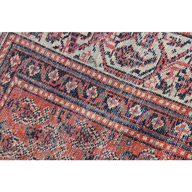 Distressed Antique Persian Malayer Runner With Field of Paisleys Design in Red 3'2"x15'2" For Sale - Image 12 of 12