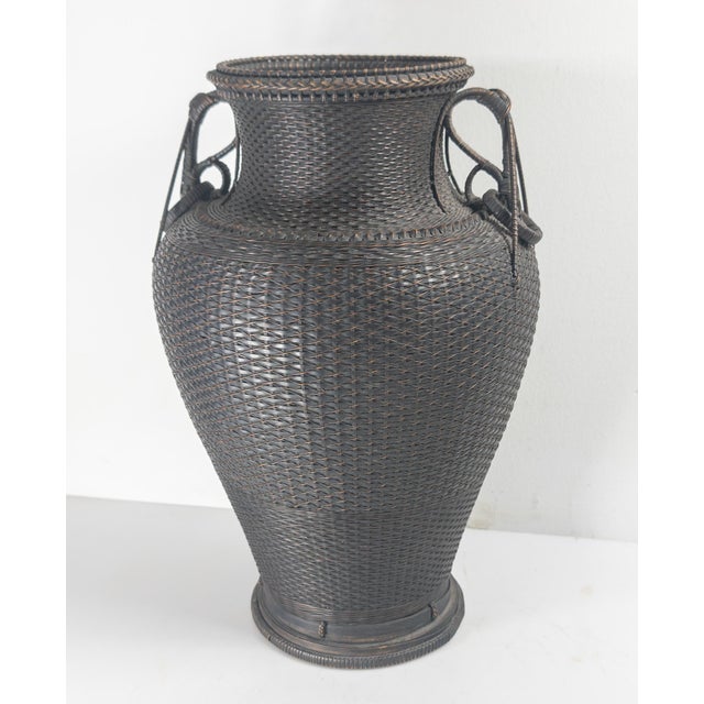 We are selling this amazing example of Japanese craftsman ship. This vase take a bronze form with elegant handles but is...