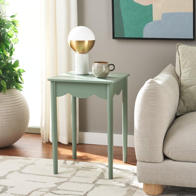 Enhance your home with the Paislynn Accent Table in a tranquil Sage color. This elegant table features a versatile design...