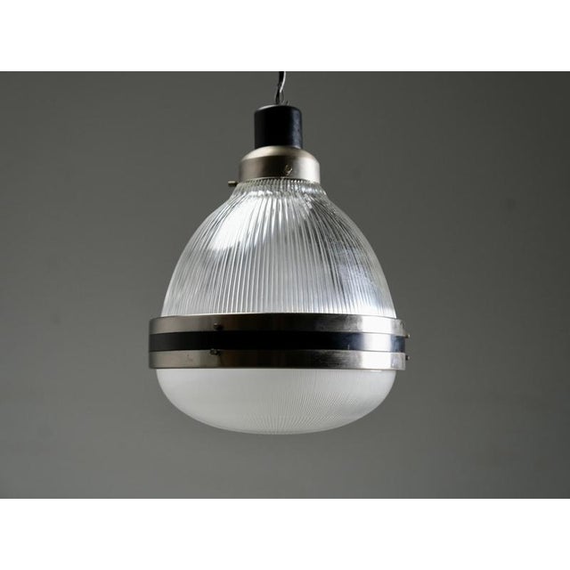 This sculptural Italian pendant lamp from the 1960s is designed in the style of Sergio Mazza and reflects the refined...