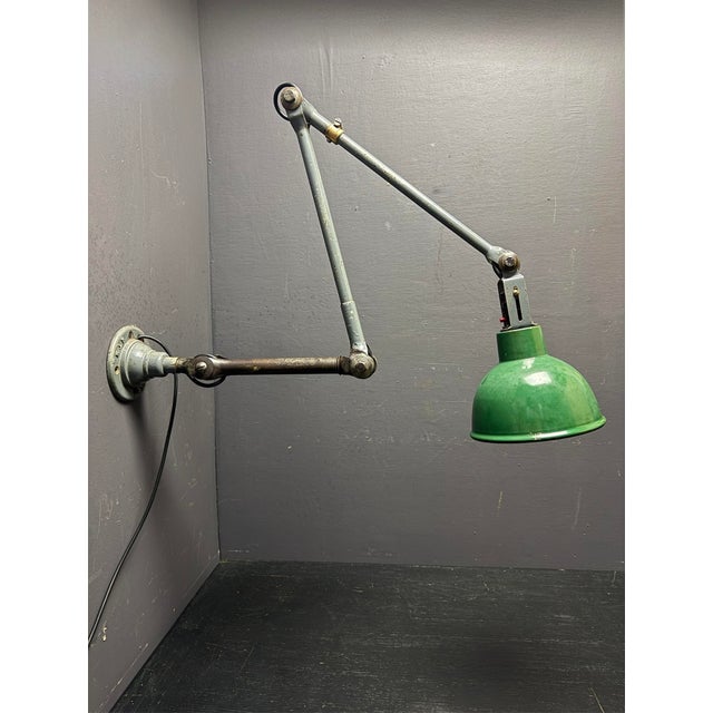 Large 1930s industrial wall mountable task lamp by british lighting company john dugdill & co. this task lamp was one of a...