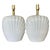 A pair of post-modern ceramic table lamps in a shell motif. This pair of lamps will add just the right touch of post...