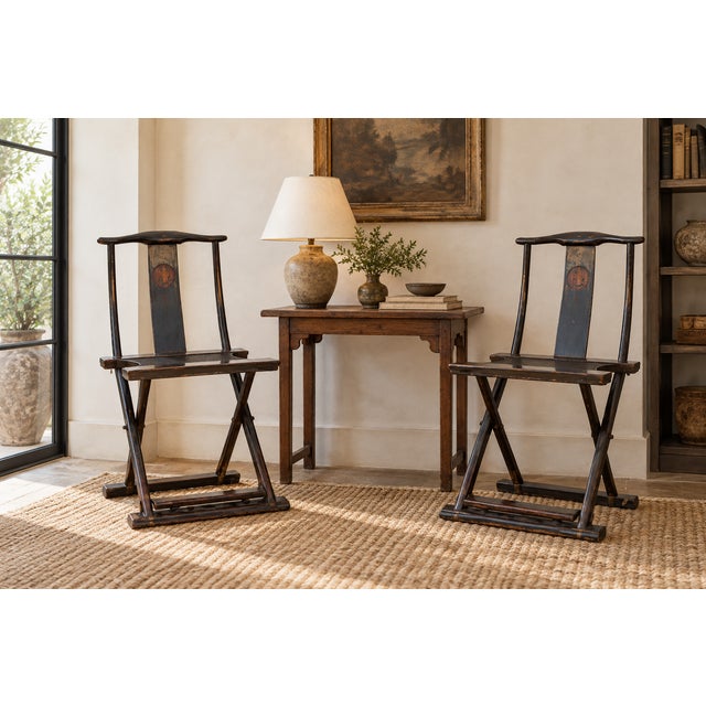 Open them where you need a seat, fold them flat when you don't. Each chair has a curved yoke crest rail, a flat splat set...