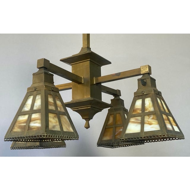 1910s Antique Arts & Crafts Mission 4-Light Brass Chandelier With Colorful "Slag Glass" Shades For Sale - Image 5 of 9
