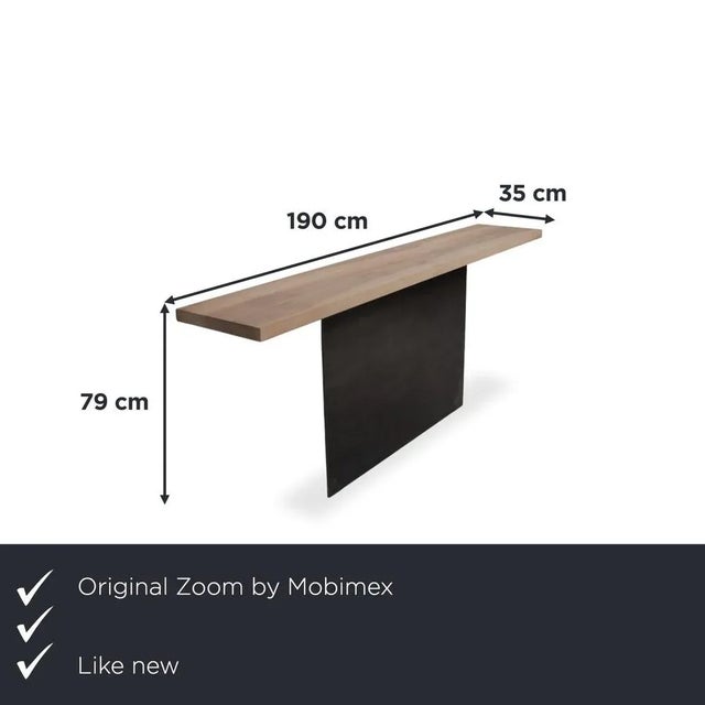with this Zoom by Mobimex TIX console table, you bring a sculptural masterpiece of Swiss design directly into your hallway...