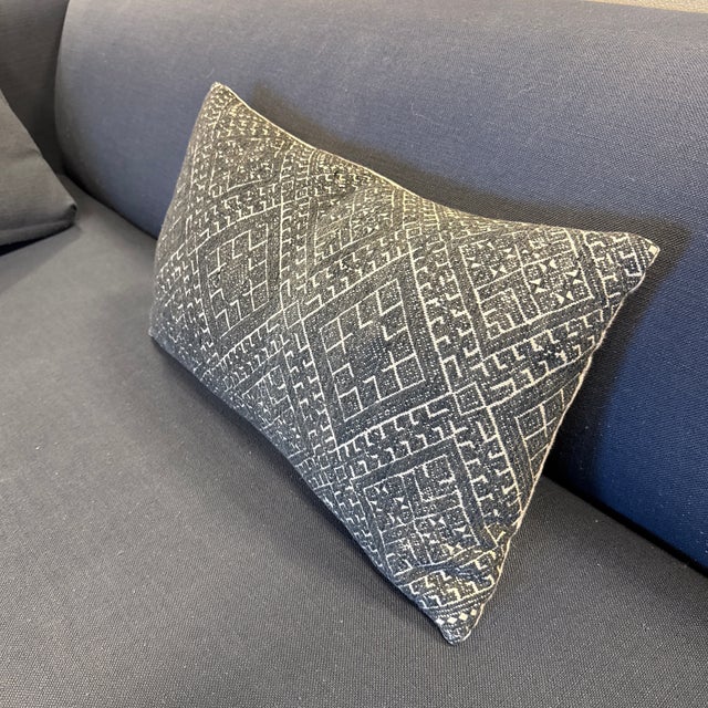 Design Plus Gallery presents a Geometric Woven Lumbar Pillow. It has an allover diamond and linear motif in charcoal and...