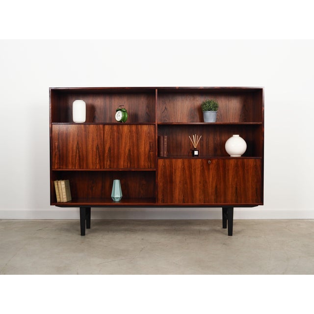 The bookcase was made in the 1970s, produced by the well-known Danish manufactory Westergaard Møbelfabrik. It was designed...