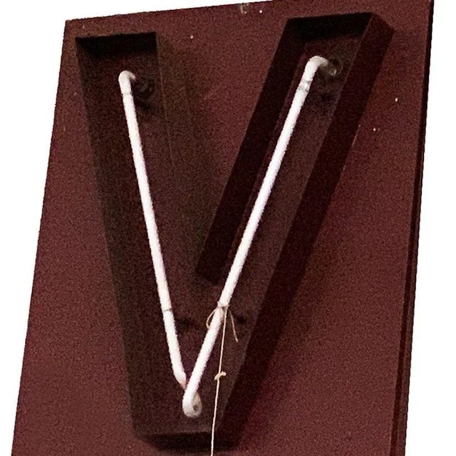 Own a piece of Los Angeles history. This large neon marquee letter "V" comes from the interior of the iconic Pan-Pacific...