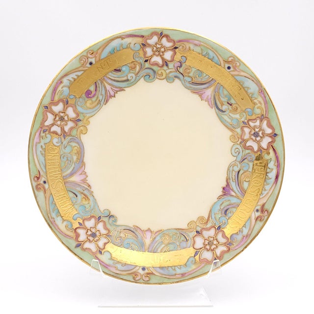 A set of eight Limoges plates (plus one extra) hand-painted with different quotations from Shakespeare.
