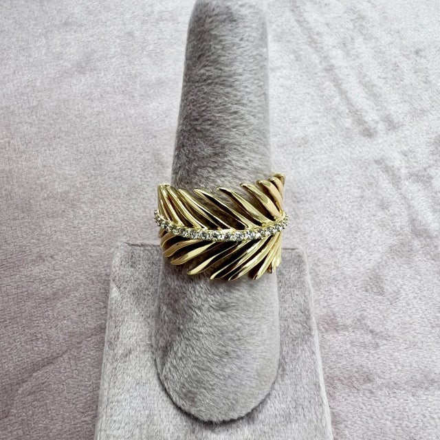 Created in 18 karat yellow gold Diamonds 0.45 carat approx. Ring size US 7, can be sized About the Designers ~ Dharmesh &...