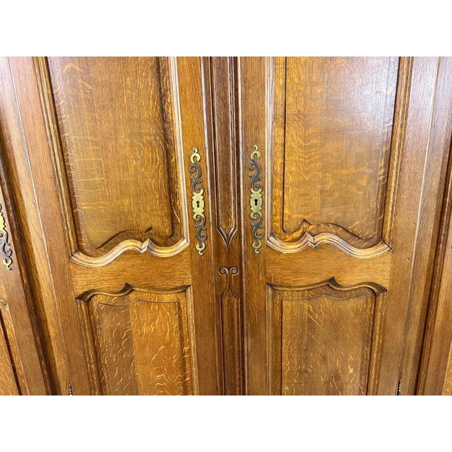 Vintage French Louis XVI Style Carved Oak 4-Door Armoire For Sale - Image 6 of 16
