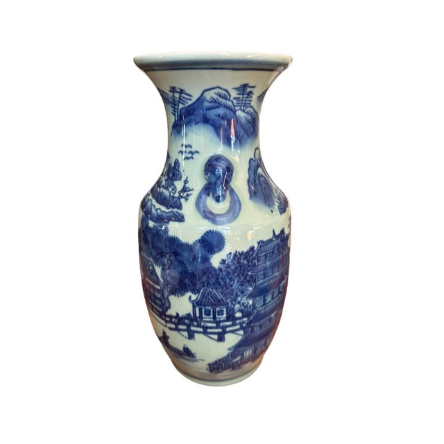 Impressive Vintage Blue and Celadon Chinoiserie Vase This vase features traditional Chinese pagoda and mountain scenes....
