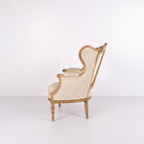 Antique bergère armchair from the 1860s in louis xvi style. Gilded wood and light upholstery. — style: louis xvi — period:...