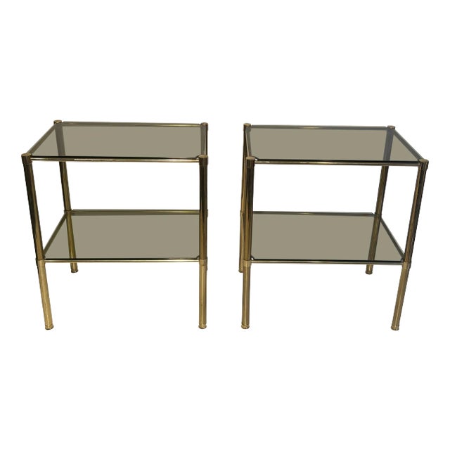 Brass Side Tables With Smoked Glass Shelves. French Work. Circa 1970 - A Pair For Sale