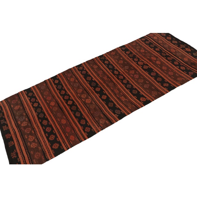 Originating from Turkey circa 1950-1960, a rare gallery-sized vintage Kilim of unusual, exemplary tribal aesthetics for...