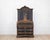Made in Denmark in the eighteenth century, this bow-fronted rococo secretary has been repainted in black with a blue...