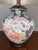 Beautiful vintage ceramic table lamp featuring a richly hand-painted peonies motif in soft pink, coral, lavender, and...