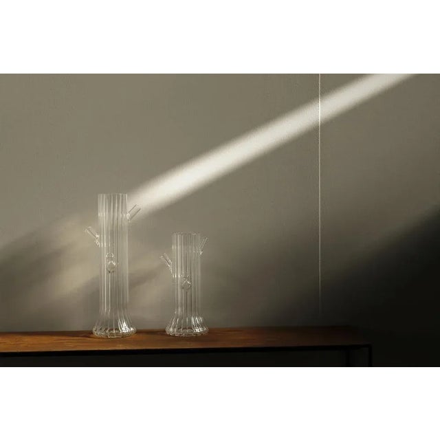 This blown Borosilicate glass vase is designed by the study A + B (Dominoni - Quaquaro) and takes its name from the...