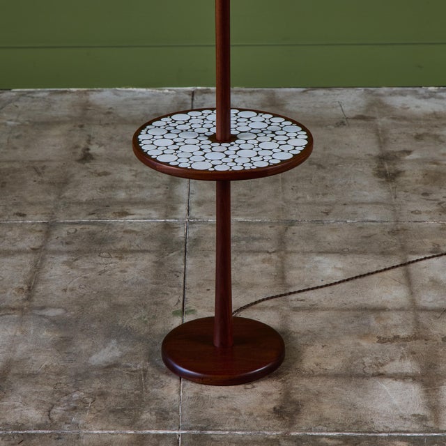 Gordon & Jane Martz floor lamp with mosaic tile round side table. This piece features a walnut base with inlaid white...