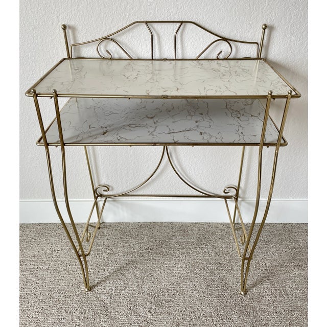 From famous mid century maker PEARL-WICK, this lovely stand will hold toiletries or other items in the most fashionable...