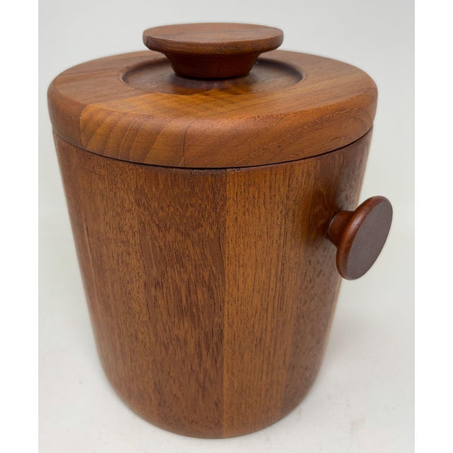 Mid-Century Danish Modern Teak Ice Bucket in the Style of Dansk, Jens Quistgaard – 1960s, Denmark. A striking example of...