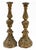 An exquisite pair of monumental Italian Baroque giltwood candlesticks, featuring richly carved architectural forms,...