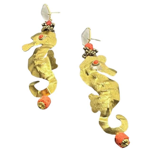 This pair of Italian earrings by Almala features a striking and whimsical design. They are shaped like seahorses, crafted...