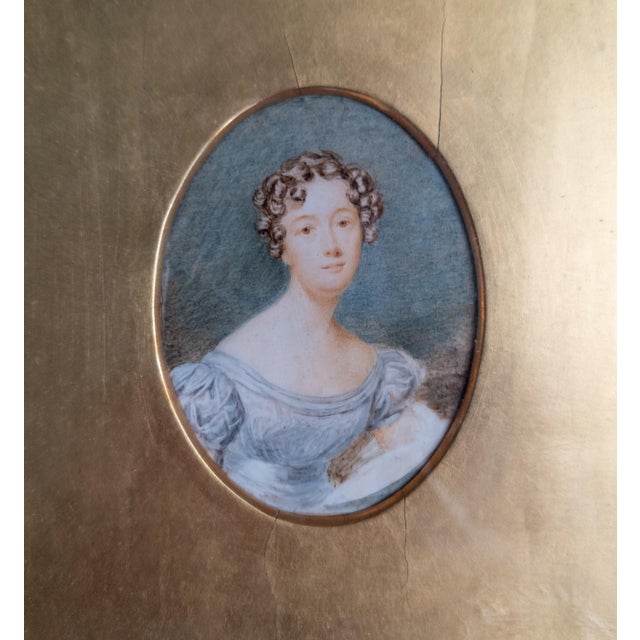 We are selling this nice loosely painted Miniature portrait of a lady. This American school painting adopts the English...