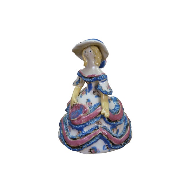 This handcrafted art pottery figurine is a classic "Southern Belle" grotesque figure created by the historic Overbeck...