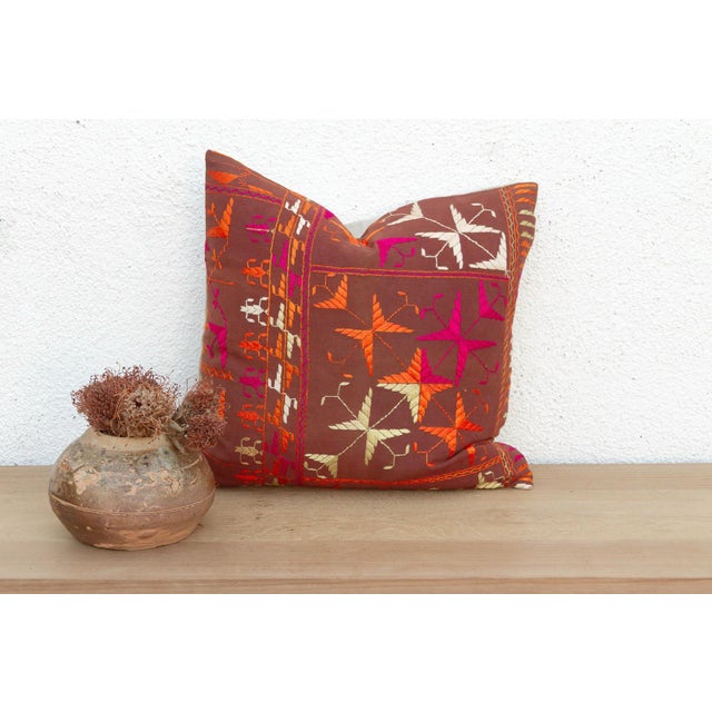 This 18-inch square pillow is a luminous masterpiece of Antique Phulkari craftsmanship, repurposed from a rare 19th-...