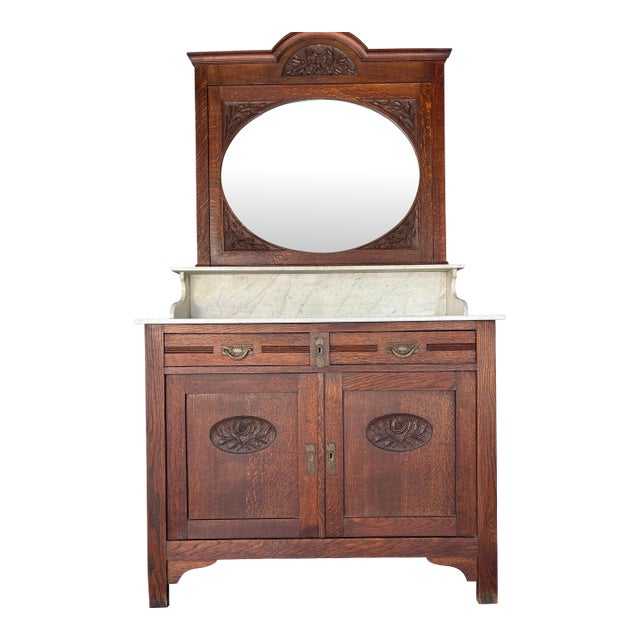 French Antique Oak Washstand / Vanity With a Marble Top, Oval Beveled Mirror, and Floral Carvings For Sale