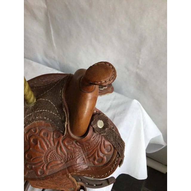 1960s Pair of Leather Horse Saddle Lamps on a Horseshoe Base Perfect for any equestrian enthusiast Tooled Leather Detail...