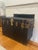 Spectacular piece of Americana, this early 20th-century flat-top cabin steamer trunk blends rugged industrial utility with...