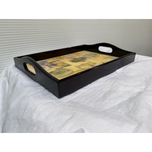 Design Plus Gallery presents a Champagne Label Decoupage Tray. The tray is made with the use of wood, resin, and fine...