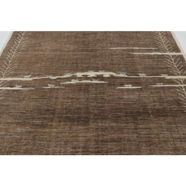 This magnificent 8x10 rug from Rug & Kilim’s Moroccan Collection is a rich Moroccan-inspired piece, hand-knotted entirely...