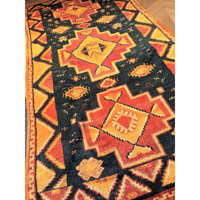 Berber carpet, old manufacture, oouazouite quality, characterized by a saffron yellow wool frame. These carpets have a...