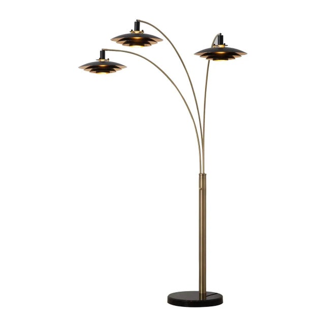 A Mid-Century Modern classic, the Rancho Mirage 3 Light Arc Floor Lamp is a captivating designer piece inspired by a...