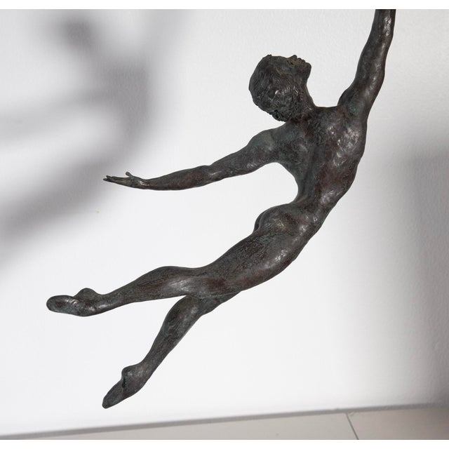 Tom Merrifield – Kenn Wells Loop Bronze Sculpture, Signed & Numbered 3/10 - 34" About the Maker Tom Merrifield (1932–2021)...