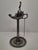 Up for sale are a pair of antique pewter whale oil or fat lamps, likely from the mid- to late 19th century, hinged lids on...