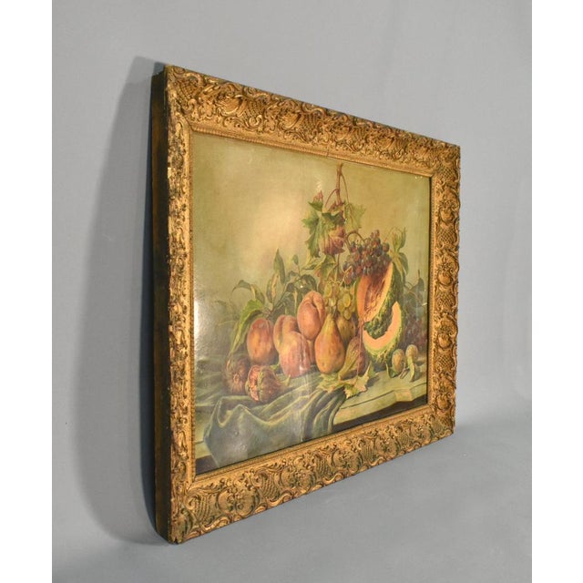 Large Giltwood Picture Frame with Intricate Decoration Louis XVI Style This large giltwood picture frame is profusely...
