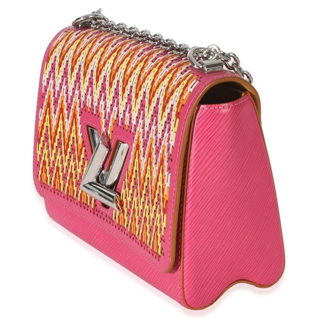 The Louis Vuitton Twist collection was unveiled in 2015. The accessory features a chunky monogram logo on the front for a...